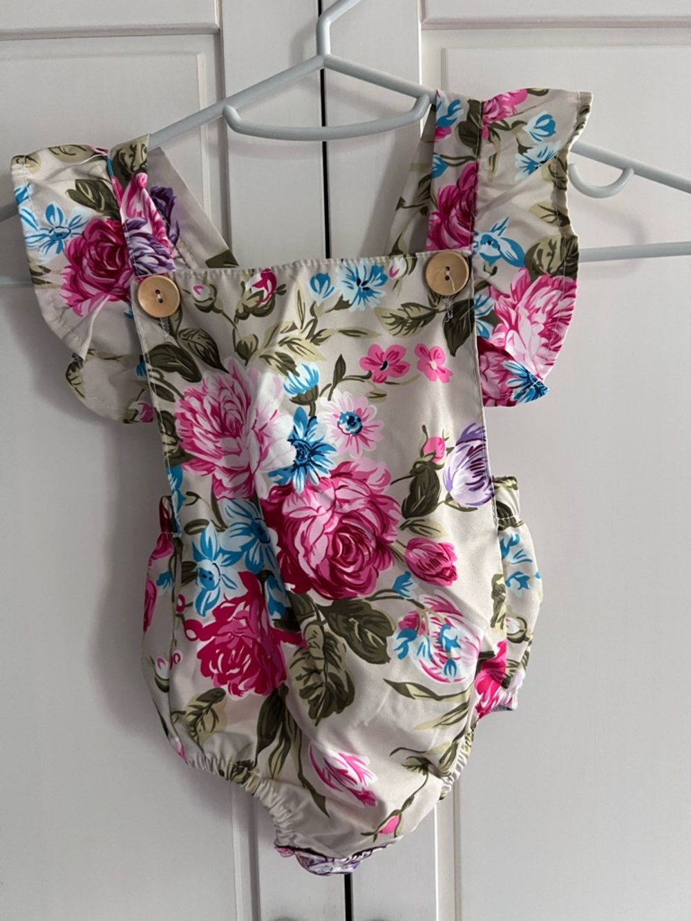 Floral Flutter Sleeve Baby One-Piece Romper - Pink & Blue